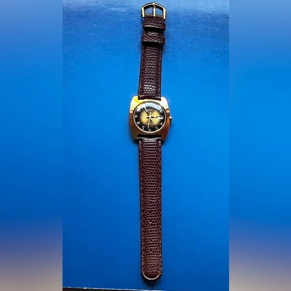 Timex Vintage Sprite Tigers Eye Face Date Manual Watch